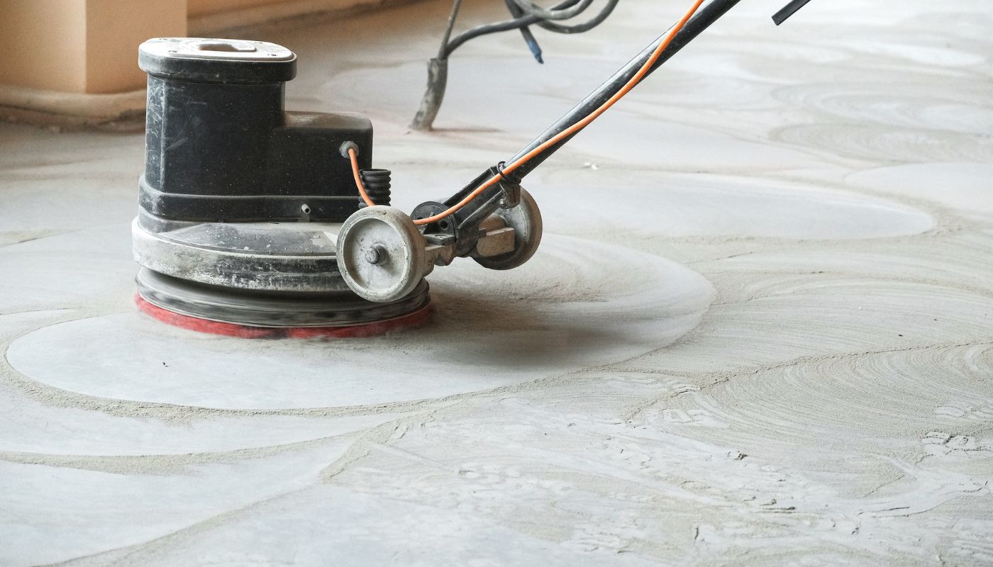 concrete grinding to smoothen and flatten uneven surfaces